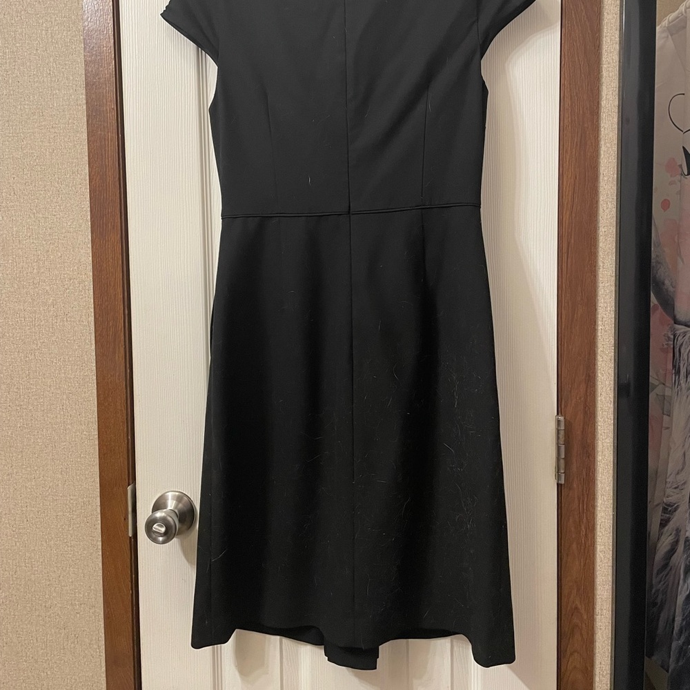 Ann Taylor size 4 black dress, back zipper, with pockets.